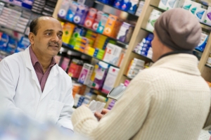 Pharmacist talking with patient